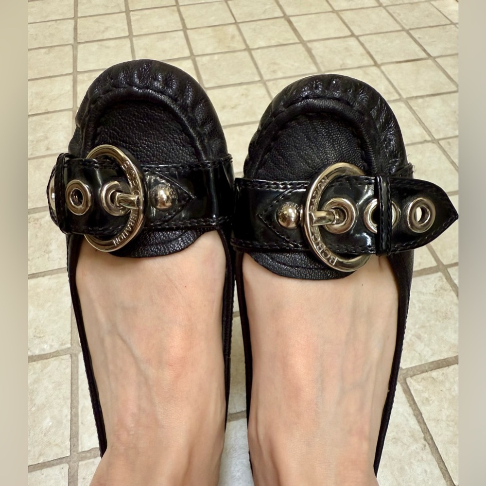 BCBGeneration Black Leather Women's slip ons - Silver buckle detail. Low heel.